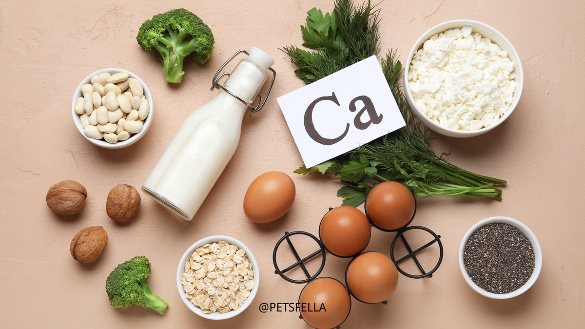 milk, eggs, nuts, broccoli lying around a white board said Ca on it 